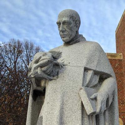 St. Albert the Great pondering a frog. Statue at St. Albert the Great Parish, Minneapolis, Minnesota
