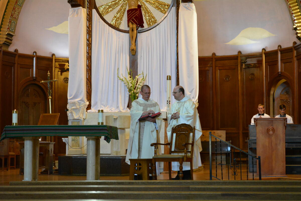 Dominican priests celebrating Mass