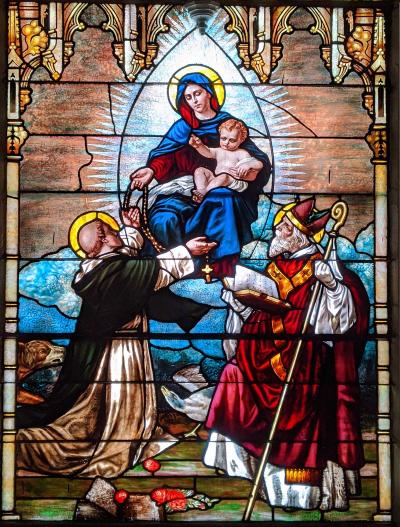 Mary giving St. Dominic the Rosary, Window in Holy Rosary Church, Minneapolis, MN, photo by Scott Steinkerchner OP