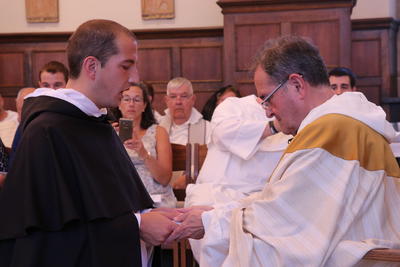 Br. Chris Johnson, OP, professing solemn vows to Fr. James V Marchionda, OP, Prior Provincial.