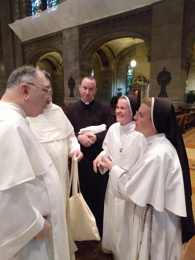 Color photo of Dominican friars and sisters in St. Paul's