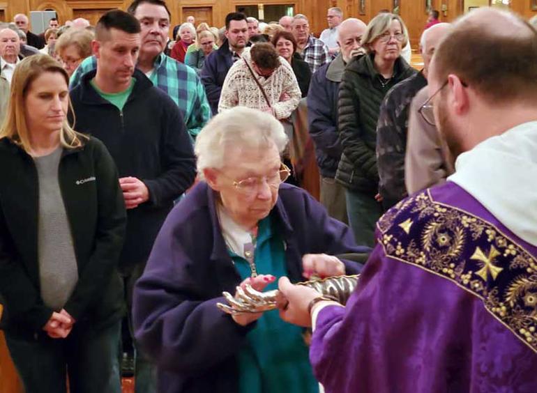 Venerating the Relic of St. Jude