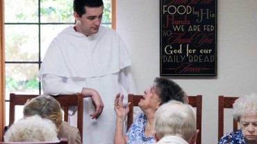 Friar talking to woman