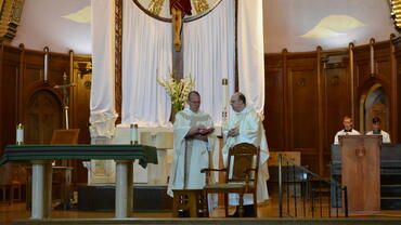 Dominican priests celebrating Mass