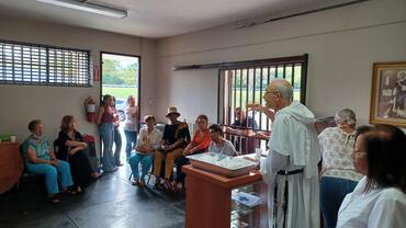 Fr. Carmen teaching aa course