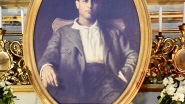 Photograph of a painting of Pier Giorgio Frassati