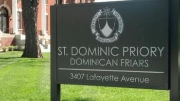 Color photographic of St Dominic Priory sign