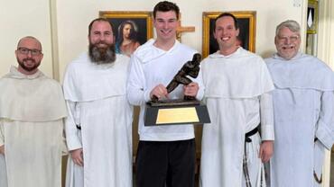 St Paul Catholic Center and Heisman Trophy winner