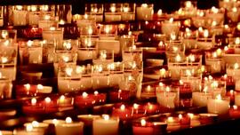 photograph of multiple votive candles